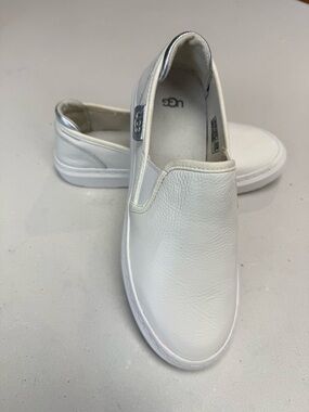 UGG Women's White Alameda Leather Slip-On Sneakers with Silver Accent